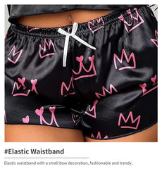™Svart satinpyjamas “Princess” med rosa 